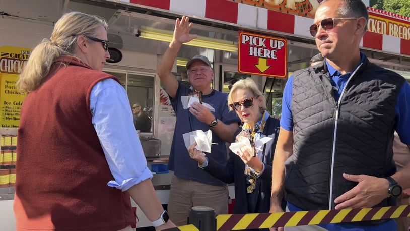 Democratic vice presidential candidate Minnesota Gov. Tim Walz visits the Minnesota State Fair Sunday, Sept. 1, 2024 in St. Paul, Minn. ( Clay Masters/Minnesota Public Radio via AP)