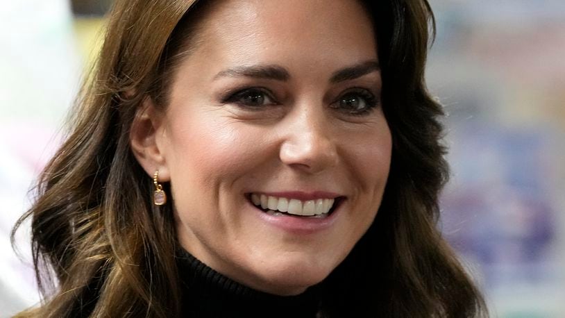 FILE - Britain's Kate, Princess of Wales smiles as she speaks to a woman during her visit to Sebby's Corner in north London on Nov. 24, 2023. (AP Photo/Frank Augstein, Pool, File)