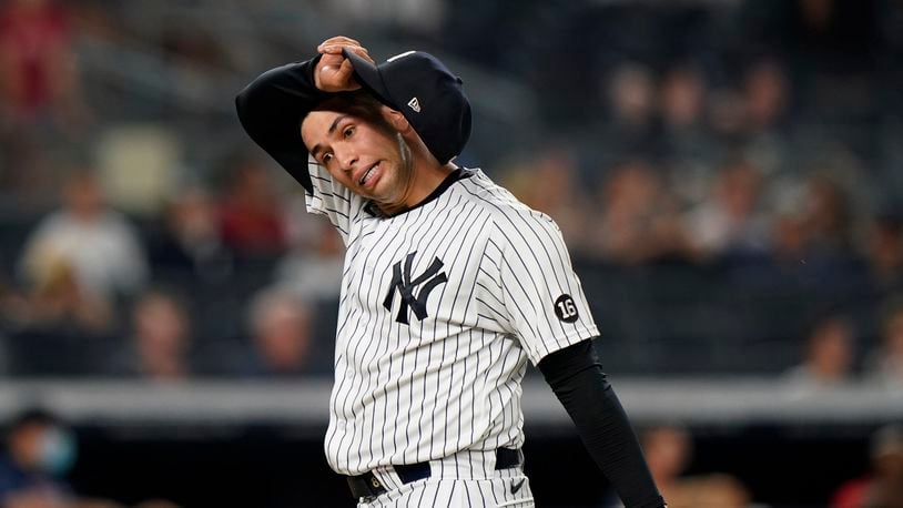 New York Yankees relief pitcher Luis Cessa (85) reacts coming off the mound after allowing a go-ahead, two-run single to Boston Red Sox's Xander Bogaerts in the 10th inning of a baseball game, Sunday, June 6, 2021, at Yankee Stadium in New York. The Red Sox defeated the Yankees 6-5 in 10 innings. (AP Photo/Kathy Willens)