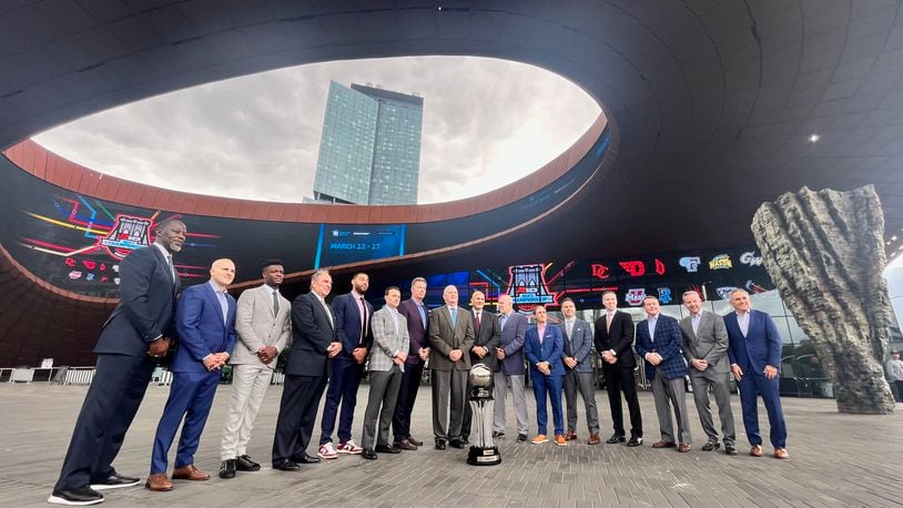 Dayton's Anthony Grant, far left, poses for a photo with other coaches at Atlantic 10 Conference Media Day on Tuesday, Oct. 17, 2023, at the Barclays Center in Brooklyn, N.Y. David Jablonski/Staff