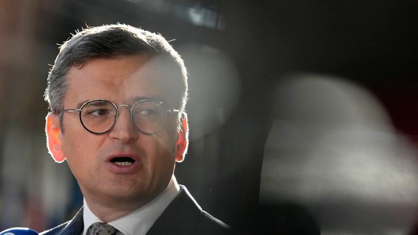 FILE - Ukraine's Foreign Minister Dmytro Kuleba speaks with the media as he arrives for a meeting of EU foreign ministers at the European Council building in Brussels, Aug. 29, 2024. (AP Photo/Virginia Mayo, File)