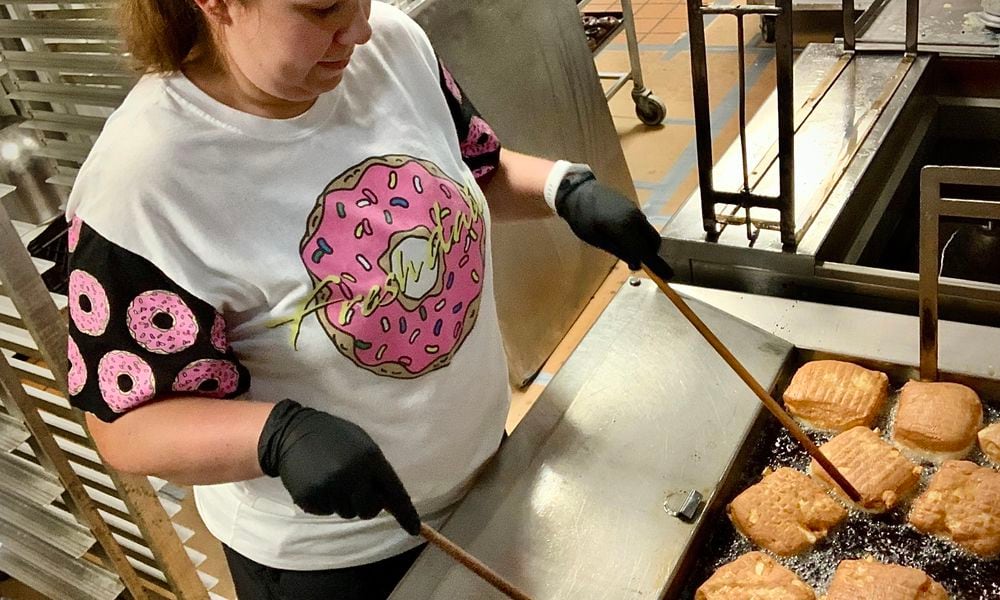 Lindsey Roberts, one of the owners of Stan the Donut Man, was busy Thursday, June 6, 2024 preparing for Natioal Donut Day, Friday, June 7, 2024. MARSHALL GORBY\STAFF