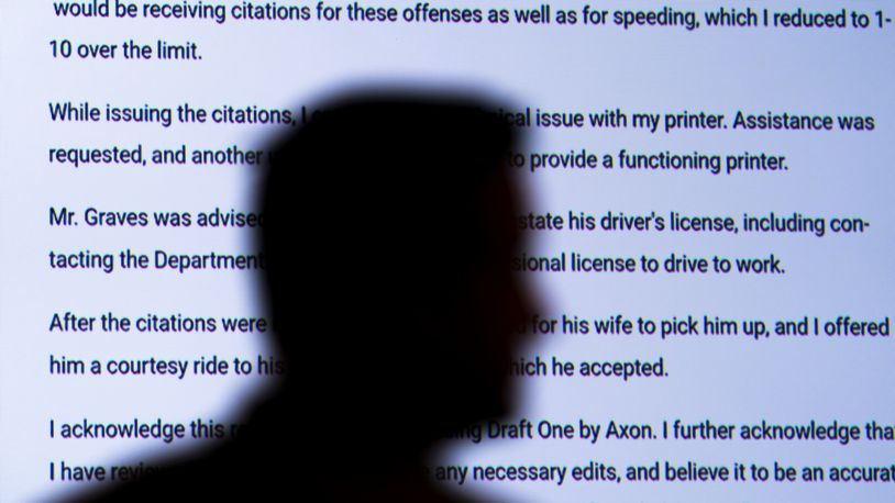 Captain Jason Bussert demonstrates Draft One, an AI powered software that creates police reports from body cam audio, at Oklahoma City police headquarters on Friday, May 31, 2024 in Oklahoma City, Oklahoma. (AP Photo/Nick Oxford)