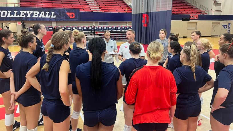 Dayton volleyball coach Tim Horsmon talks to players at practice on Wednesday, Aug. 28, 2024, at the Frericks Center. David Jablonski/Staff