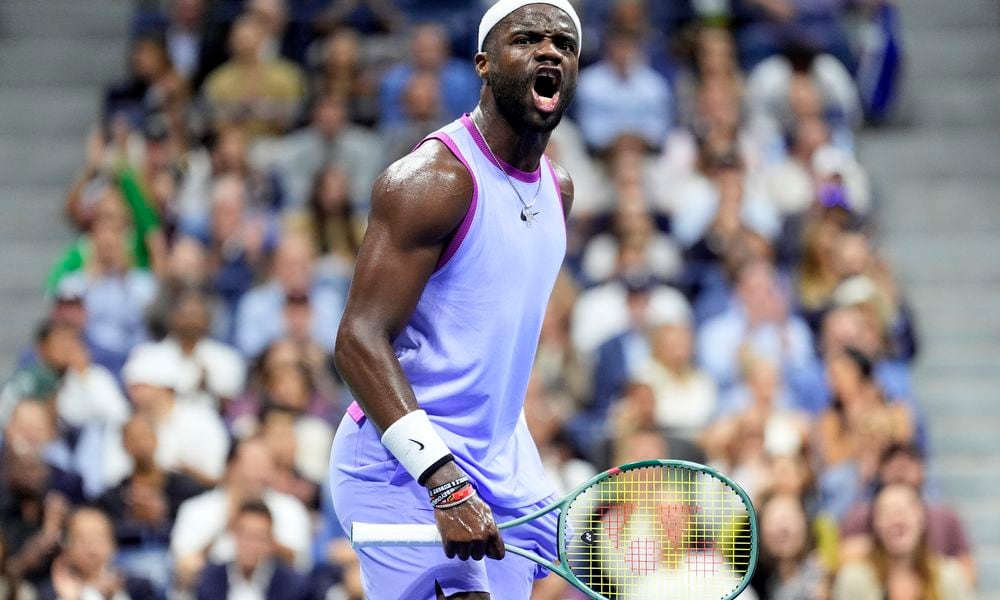 Frances Tiafoe, of the United States, celebrates after winning a point against Grigor Dimitrov, of Bulgaria, during the quarterfinals of the U.S. Open tennis championships, Tuesday, Sept. 3, 2024, in New York. (AP Photo/Eduardo Munoz Alvarez)