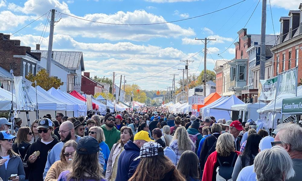 The Waynesville Sauerkraut Festival typically draws in more than 350,000 attendees each year, event organizers say. STAFF