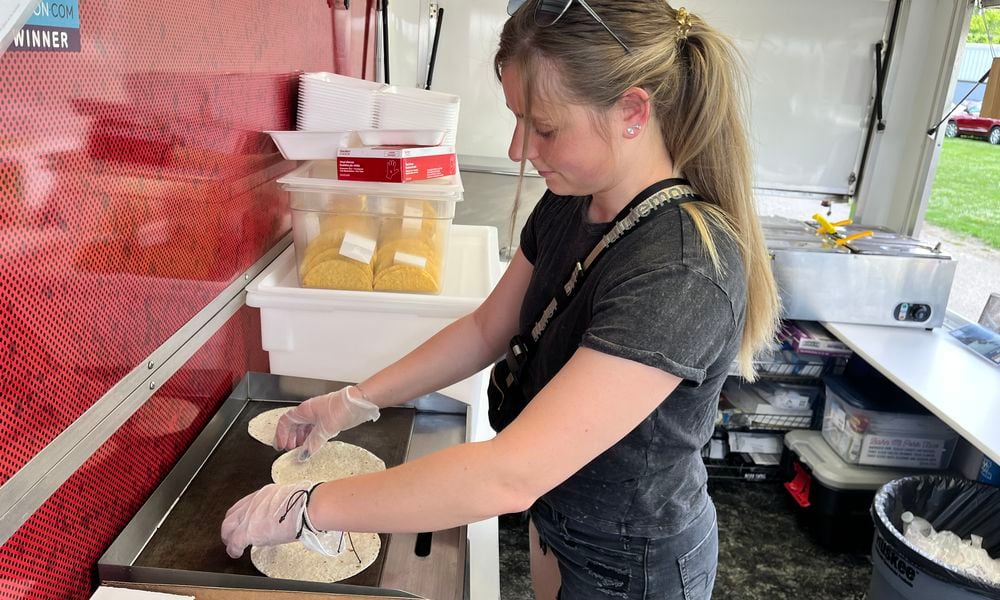 Dayton Daily News Reporter Natalie Jones gains food truck experience with Cory Thompson, the owner of What The Taco?!