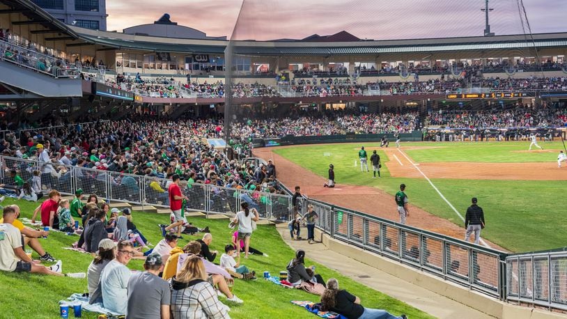 The Dayton Dragons played their home opener on Tuesday, Apr. 11, 2023 at Day Air Ballpark in downtown Dayton to a sellout crowd of 8,135, extending the team’s streak to 1,442 games, an all-time record for professional sports franchises. The Dragons lost to the Great Lakes Loons 9-7. Did we spot you there? TOM GILLIAM/CONTRIBUTING PHOTOGRAPHER