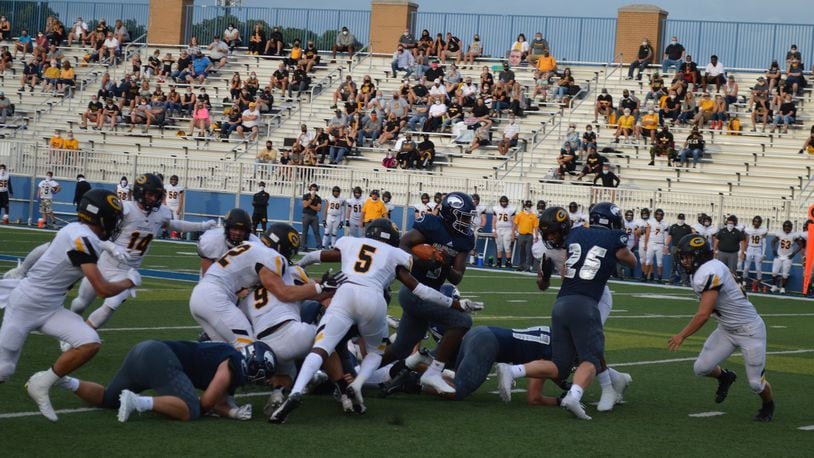 Fairmont's Tank Gant runs the ball against Centerville in the season opener at Roush Stadium on Friday, Aug. 28, 2020. Eric Frantz/CONTRIBUTED