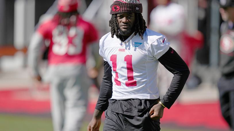 FILE - San Francisco 49ers wide receiver Brandon Aiyuk (11) warms up during a practice ahead of the Super Bowl 58 NFL football game Saturday, Feb. 10, 2024, in Las Vegas. (AP Photo/John Locher, File)