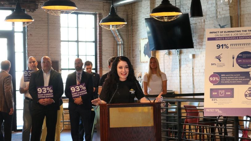 Lindsay O’Dell, a bartender at Submarine House's Huber Heights location, voices opposition to a possible ballot measure by One Fair Wage to raise minimum wage for Ohio tipped workers. O'Dell made her remarks during an Ohio Restaurant & Hospitality Alliance press conference at Jackie O's on Fourth in Columbus Tuesday, May 21, 2024. CONTRIBUTED