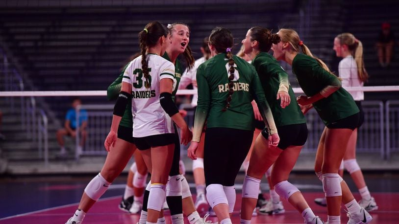 Members of the Wright State volleyball team celebrate a point during an exhibition match vs. Cincinnati last month. Joe Craven/Wright State Athletics