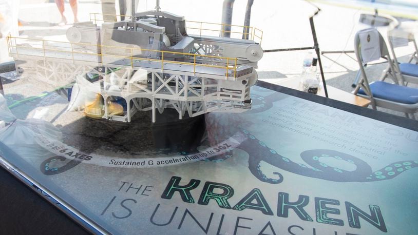 A model of the disorientation research device nicknamed “The Kraken” is displayed at the dedication ceremony for the Captain Ashton Graybiel Acceleration Research Facility at Naval Medical Research Unit Dayton, June 17, 2016 on Wright-Patterson Air Force Base, Ohio. The Kraken, named for a mythical sea monster and which is housed at the facility, allows researchers to create the most realistic motion simulations ever seen, using all six degrees of freedom and up to three G's of force. (U.S. Air Force photo by R.J. Oriez/Released)