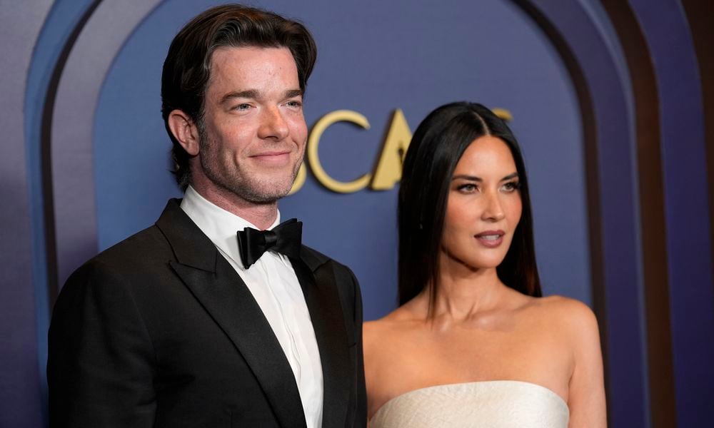 FILE - John Mulaney, left, and Olivia Munn arrive at the Governors Awards, Jan. 9, 2024, at the Dolby Ballroom in Los Angeles. (AP Photo/Chris Pizzello, File)