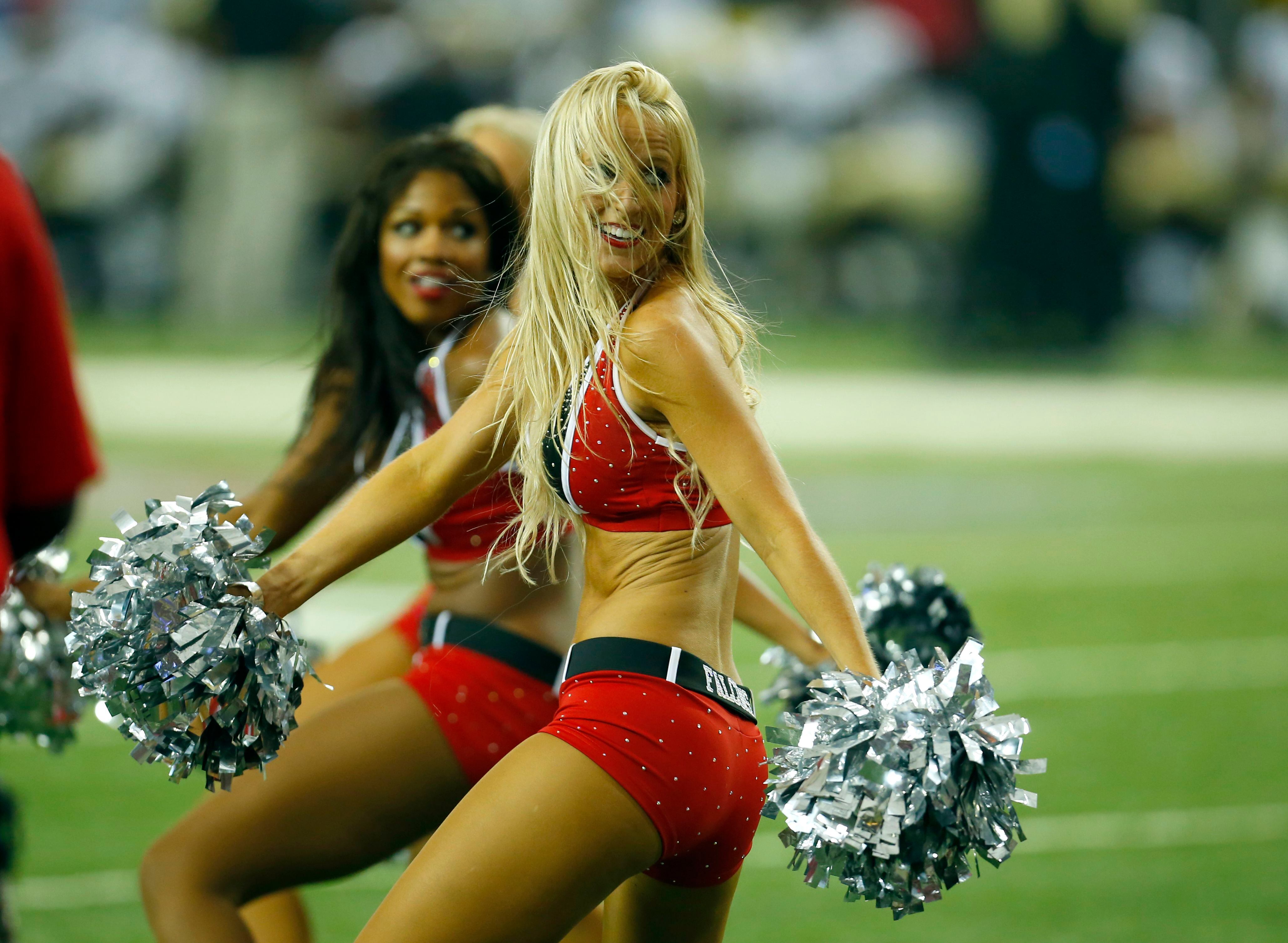 Buffalo Bills cheerleaders cheer against the Chicago Bears during the first  half of an NFL football game at the Rogers Centre in Toronto, Sunday, Nov.  7, 2010. (AP Photo/David Duprey Stock Photo 