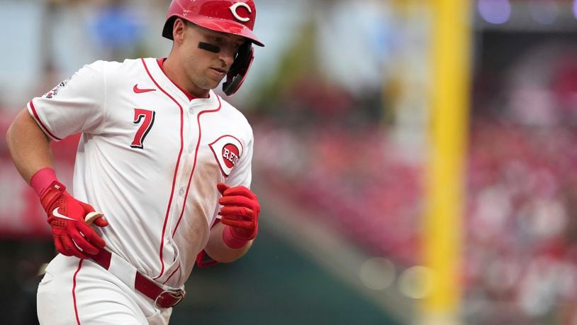 Cincinnati Reds' Spencer Steer rounds third base after hitting a three-run home run during the fifth inning of a baseball game against the St. Louis Cardinals, Monday, Aug. 12, 2024, in Cincinnati. (AP Photo/Kareem Elgazzar)