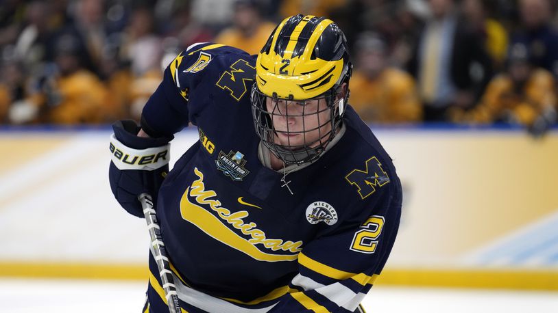 FILE - Michigan forward Rutger McGroarty (2) against Quinnipiac during the first period of an NCAA semifinal game in the Frozen Four college hockey tournament, April 6, 2023, in Tampa, Fla. (AP Photo/Chris O'Meara, File)