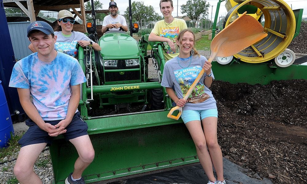 The Foodbank garden team includes front row (left) Bryan Walbridge and Clara Bement; second row (left) Courtney Curtner and Nathan Vanbeysterveldt; and on the tractor is James Hoffer. MARSHALL GORBY/STAFF