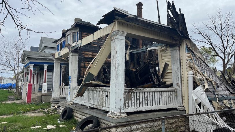 A fire destroyed this vacant home at 28 Findlay St. in East Dayton and spread to a vacant home and an occupied home next door. CORNELIUS FROLIK / STAFF