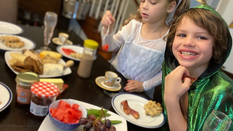 Miro (left) and Miles Deal enjoying a “royal” breakfast the entire family made together. CONTRIBUTED