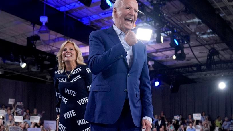 President Joe Biden, right, and first lady Jill Biden walk off stage after speaking at a campaign rally, Friday, June 28, 2024, in Raleigh, N.C. (AP Photo/Evan Vucci)
