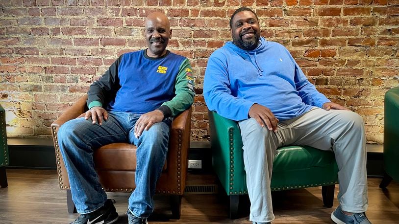 Dallas Webster and Jeff Jackson (left to right), neighbors for 15 years, are investing in their community by opening a cigar shoppe and lounge in Dayton’s Wright Dunbar Business District. NATALIE JONES/STAFF