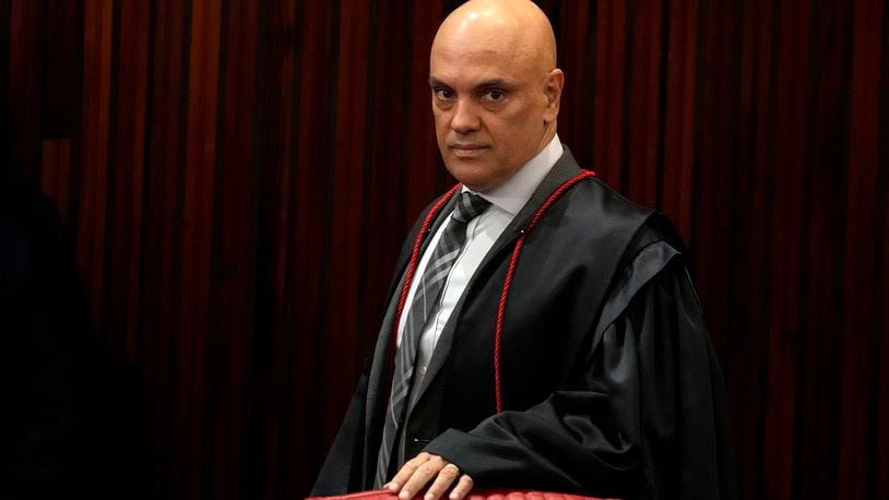 FILE - Brazilian Supreme Court Chief Justice Alexandre de Moraes arrives for a court hearing, in Brasilia, Brazil, June 22, 2023. (AP Photo/Eraldo Peres, File)