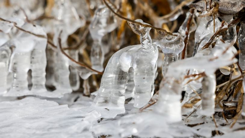 Below freezing temperatures has ice forming in areas of the Great Miami River Monday morning, Jan. 15, 2024, in Hamilton. NICK GRAHAM/STAFF