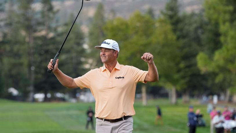 Patton Kizzire celebrates after winning the Procore Championship golf tournament at Silverado Resort North Course, Sunday, Sept. 15, 2024, in Napa, Calif. (AP Photo/Godofredo A. Vásquez)