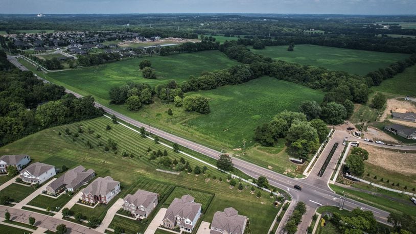 An aerial shot of the Stonehill Village development near the intersection with Stonebury Court and Trebein Road. JIM NOELKER/STAFF