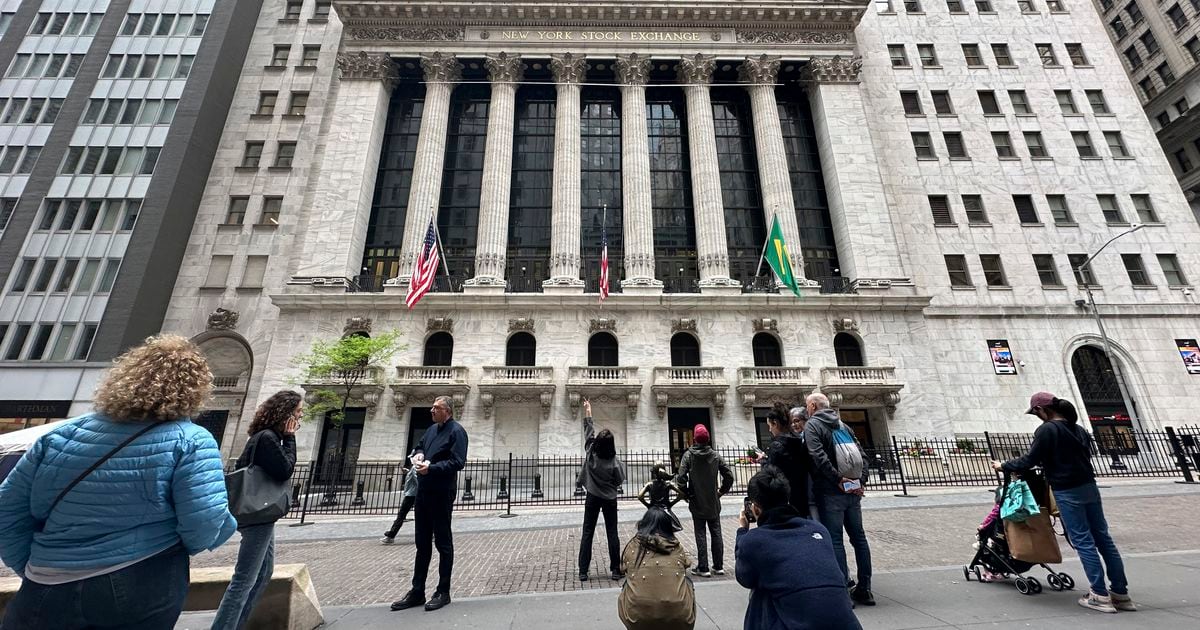 Nasdaq sets new record as Wall Street regains earlier losses
