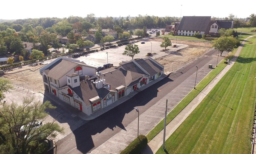 An Elsa's Mexican Restaurant sits along Far Hills Avenue in Centerville, with Epiphany Lutheran Church in the background. Sheetz, Morse Road Development LLC and Hemmert Far Hills LLC are suing Epiphany, Bethany Village retirement community and the city of Centerville in hopes of constructing a 6,139-square-foot Sheetz on the site of the restaurant. STAFF FILE PHOTO