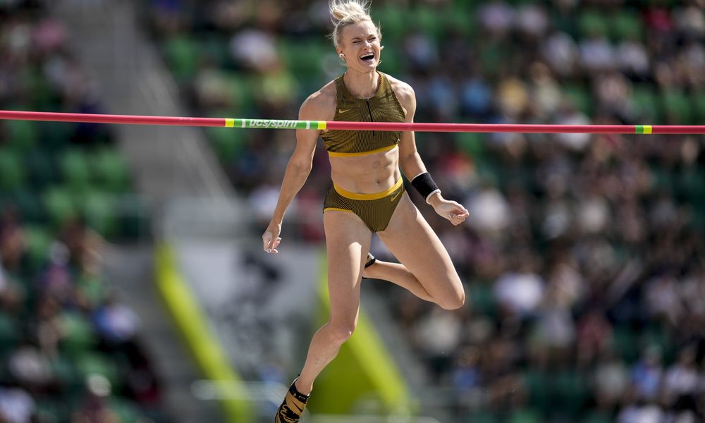 Katie Moon reacts after clearing the bar as she competes in the women's pole vault final during the U.S. Track and Field Olympic Team Trials, Sunday, June 30, 2024, in Eugene, Ore. (AP Photo/Charlie Neibergall)