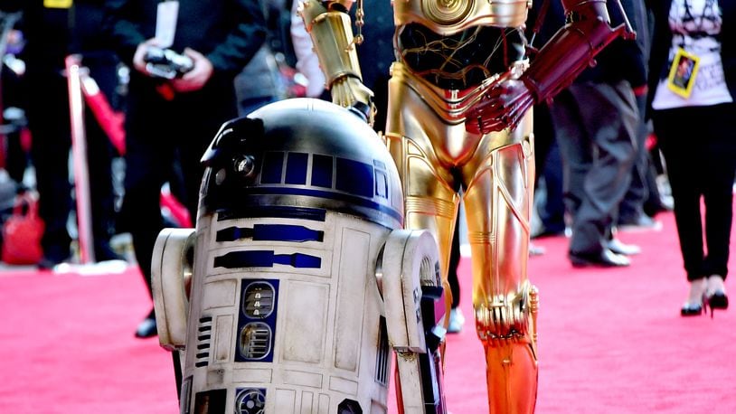 HOLLYWOOD, CA - DECEMBER 14: R2-D2 and C-3PO attend the premiere of Walt Disney Pictures and Lucasfilm's "Star Wars: The Force Awakens" at the Dolby Theatre on December 14th, 2015 in Hollywood, California. (Photo by Frazer Harrison/Getty Images)