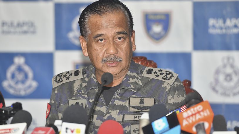 Malaysia Inspectors-General of Police Razarudin Husain speaks during a press conference in Kuala Lumpur, Monday, Sept. 23, 2024. (AP Photo)