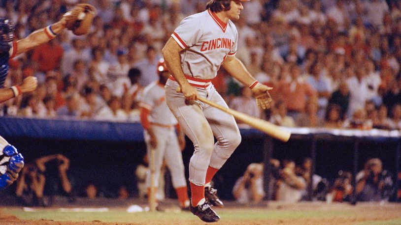 FILE - Pete Rose of the Cincinnati Reds in action at the bat against the Atlanta Braves in Atlanta, Aug. 2, 1978. At left is Atlanta catcher Joe Nolan. (AP Photo, File)