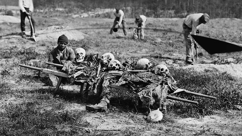 African American Men Collecting Bones, Cold Harbor, VA, April 1865. (John Reekie, compiled by Hirst D. Milhollen and Donald H. Mugridge / Wikimedia Commons)