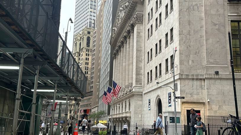 The New York Stock Exchange, center, is shown on Friday, Sept. 27, 2024, in New York. (AP Photo/Peter Morgan)