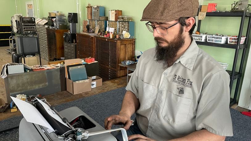 TB Writers Plus is a typewriter sales and repair shop located in the Davis-Linden Building at 400 Linden Ave. in Dayton. Pictured is owner Trevor Brumfield. NATALIE JONES/STAFF