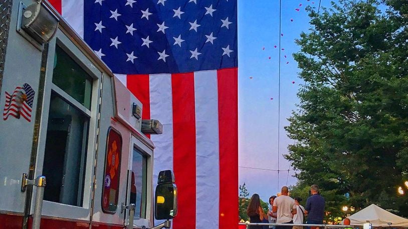 International Peace Museum Senior Advisor Kevin Kelly's photos from the aftermath of the 2019 Oregon District shooting is on display through September at the International Peace Museum. The exhibit also includes photos from Dayton Daily News Contributing Photographer Tom Gilliam. CONTRIBUTED