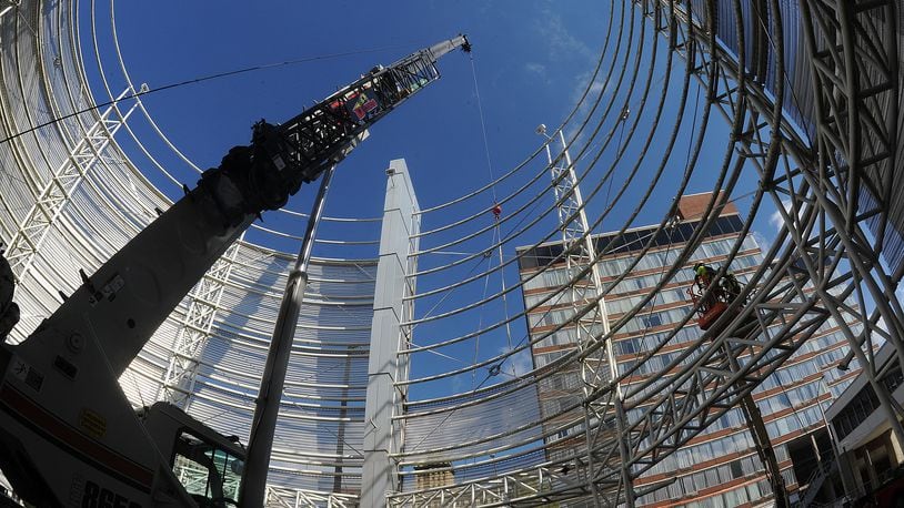 Demolition started early Tuesday morning Aug. 16, 2022 on the structure in front of the Dayton Convention Center. MARSHALL GORBY\STAFF