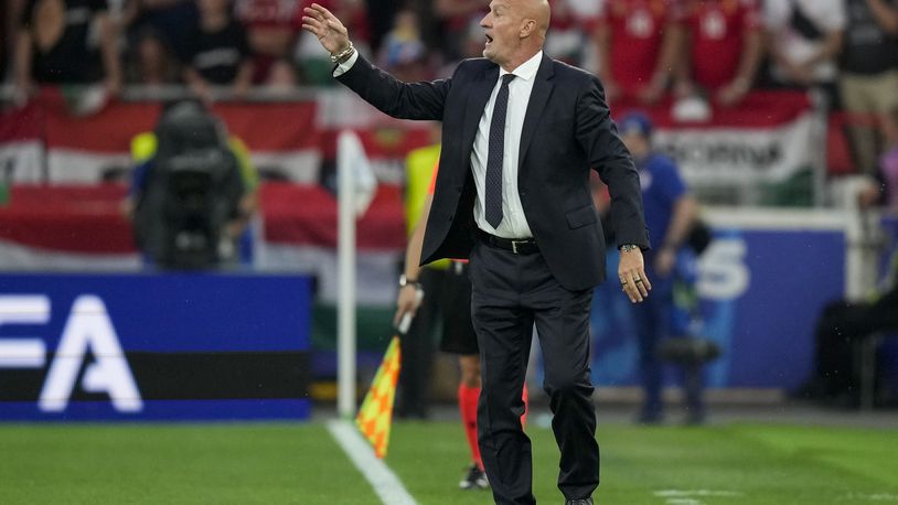 Hungary's coach Marco Rossi gestures during a Group A match between Scotland and Hungary at the Euro 2024 soccer tournament in Stuttgart, Germany, Sunday, June 23, 2024. (AP Photo/Matthias Schrader)