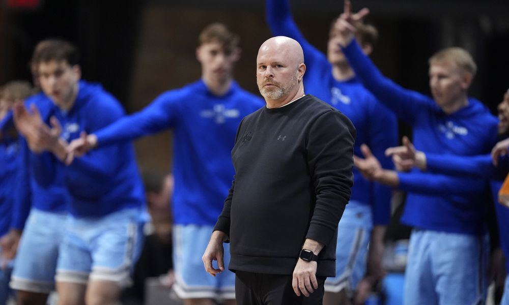 Indiana State coach Josh Schertz watches from the bench during the first half of an NCAA college basketball game against Utah in the semifinals of the NIT, Tuesday, April 2, 2024, in Indianapolis. (AP Photo/Michael Conroy)