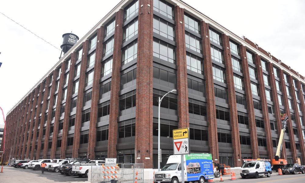 Parts of the Delco building are expected to open around June, including about 30 of its 160 apartments and the 482 public parking spaces. The Delco is a massive, mixed-use development located just south of the Day Air Ballpark, where the Dayton Dragons play baseball in downtown Dayton. CORNELIUS FROLIK / STAFF