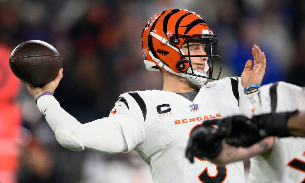 Cincinnati Bengals quarterback Joe Burrow (9) looks to pass in the first half of an NFL football game against the Baltimore Ravens in Baltimore, Thursday, Nov. 16, 2023. (AP Photo/Nick Wass)