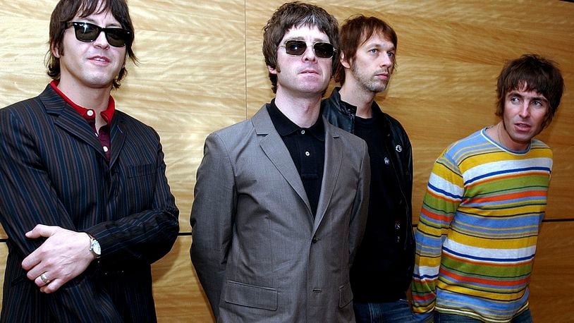 FILE - Members of British rock band Oasis pose for photos ahead of a concert in Hong Kong, Feb. 25, 2006. From left are, Gem Archer, Noel Gallagher, Andy Bell, and Liam Gallagher. (AP Photo/Lo Sai Hung)