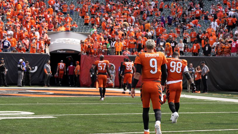 Cincinnati Bengals quarterback Joe Burrow (9) walks off the field after an NFL football game against the New England Patriots, Sunday, Sept. 8, 2024, in Cincinnati. The Patriots won 16-10. (AP Photo/Jeff Dean)