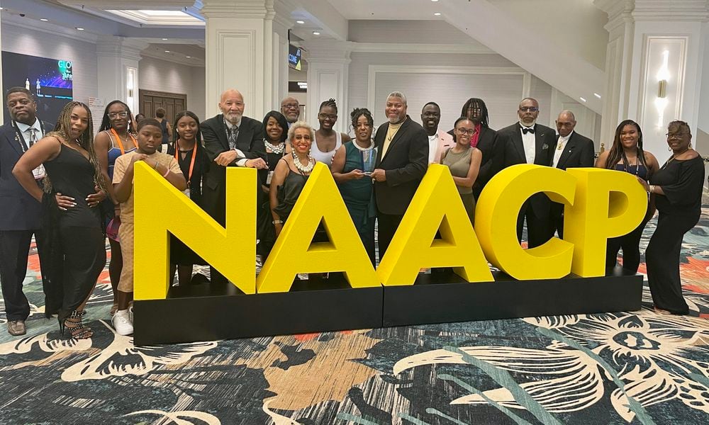 Dayton Branch NAACP President Derrick Foward recently accepted the Thalheimer Award on behalf of the local chapter. CONTRIBUTED