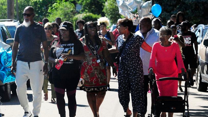Over one hundred people turned out for a balloon release Sunday, June 30, 2024 in Dayton for a young man that was shot and killed by Dayton Police. MARSHALL GORBY\STAFF
