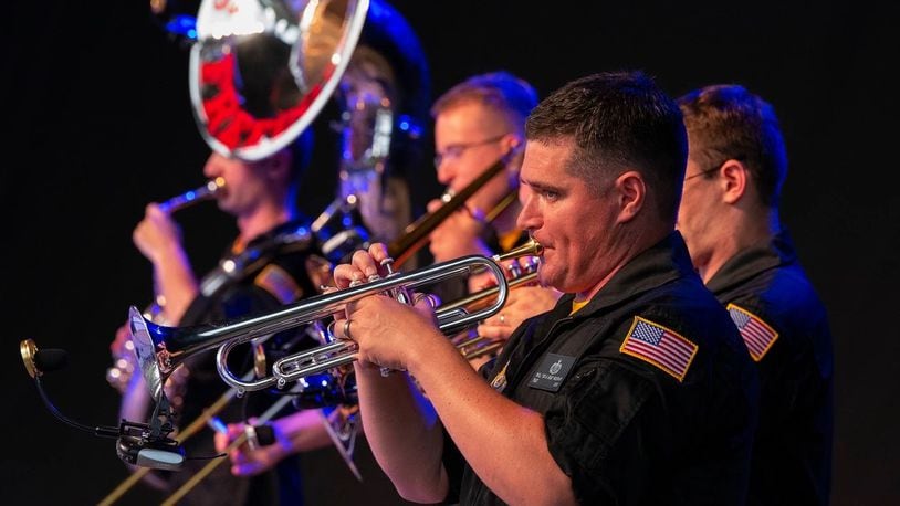 Tech. Sgt. Will McCrary and the U.S. Air Force Band of Flight perform at Fraze Pavilion July 27, 2022, in Kettering. The band, stationed at Wright-Patterson Air Force Base, gave the free show as a tribute to the 75th anniversary of the U.S. Air Force. (U.S. Air Force photo by R.J. Oriez)